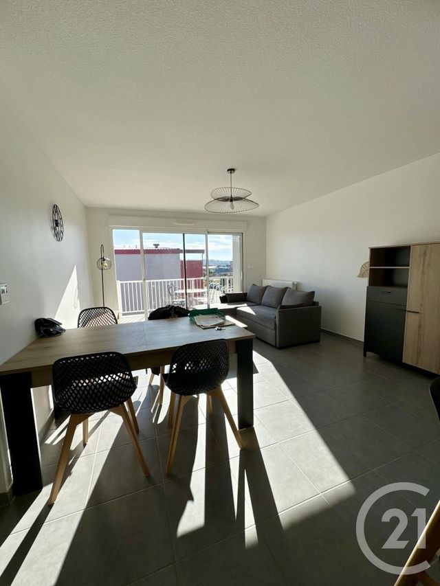 Appartement T2 à louer - 2 pièces - 47.56 m2 - ONET LE CHATEAU - 12 - MIDI-PYRENEES - Century 21 Foch Immobilier