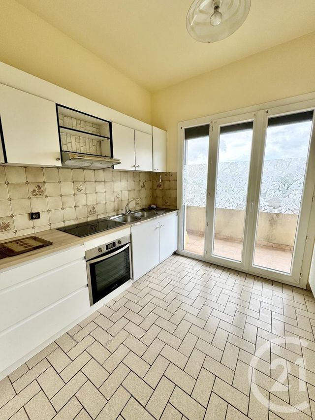 Appartement T2 à louer - 2 pièces - 41.29 m2 - BARAQUEVILLE - 12 - MIDI-PYRENEES - Century 21 Foch Immobilier
